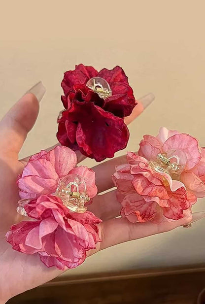 Ailsas camellia claw clip features silicone-wrapped teeth and 3mm gradient petals for secure yet crease-free ponytails.