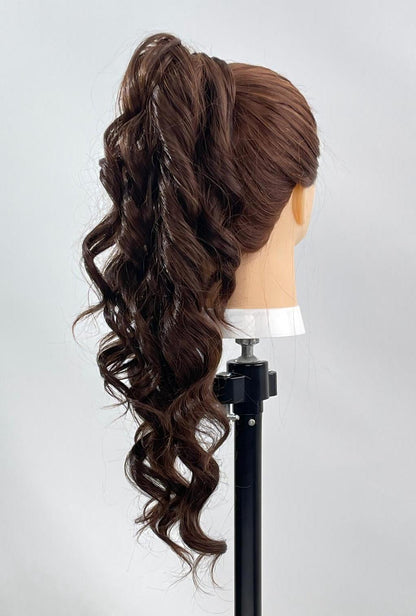 Karen by Ailsa’s Wigs from the right-back angle, featuring deep brown waves and a seamless wrap-around ponytail extension that blends naturally with warm-toned styling.