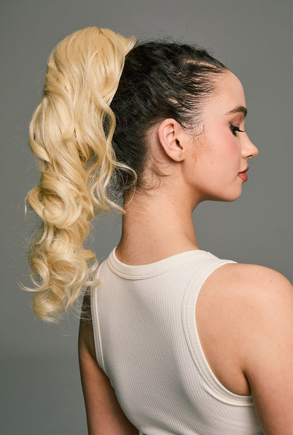 Melody by Ailsa's Wigs – Heat-resistant synthetic ponytail in blonde tone, effortlessly styled for daily glam with invisible wrap-around design.