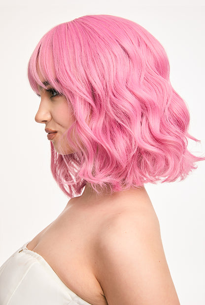 Profile view of 12" Petal bob wig by Ailsa's Wigs with perfectly layered bangs and curls