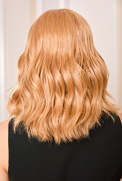 Voluminous back curls of Sandy wig by Ailsa's Wigs featuring proprietary spiral curl technology