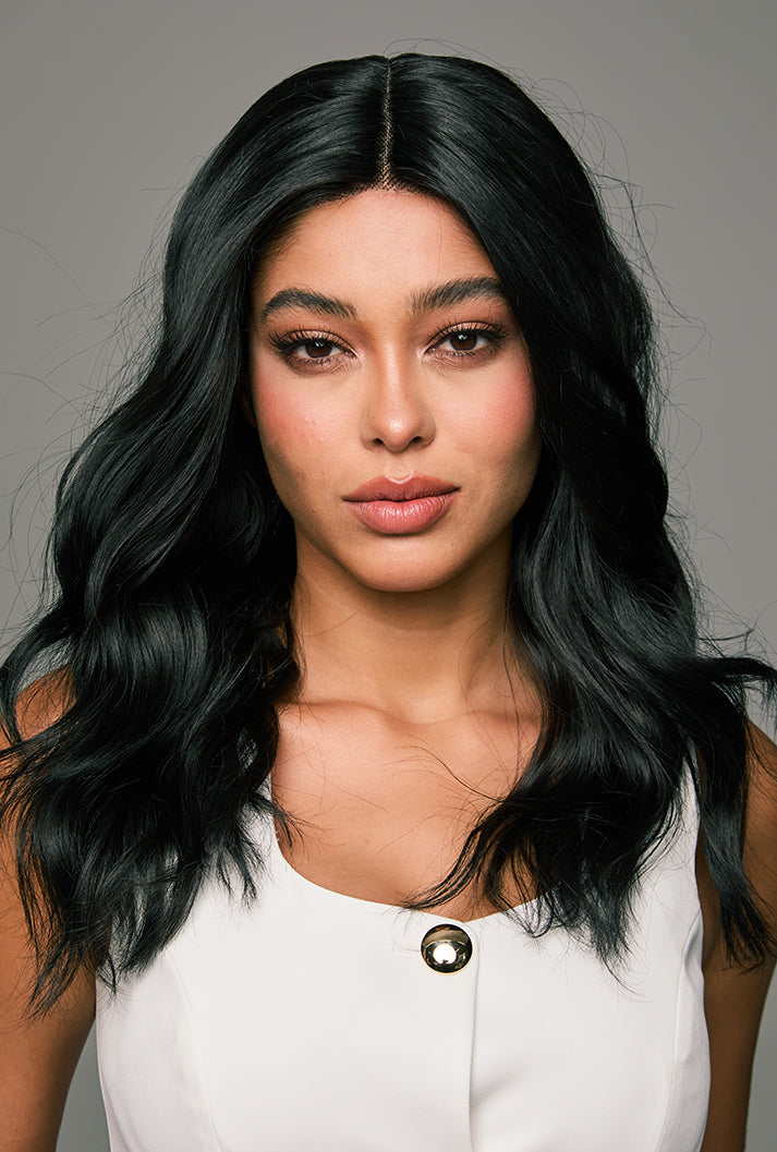 Office-appropriate styling of Maya wig by Ailsa's Wigs with professional yet voluminous curls