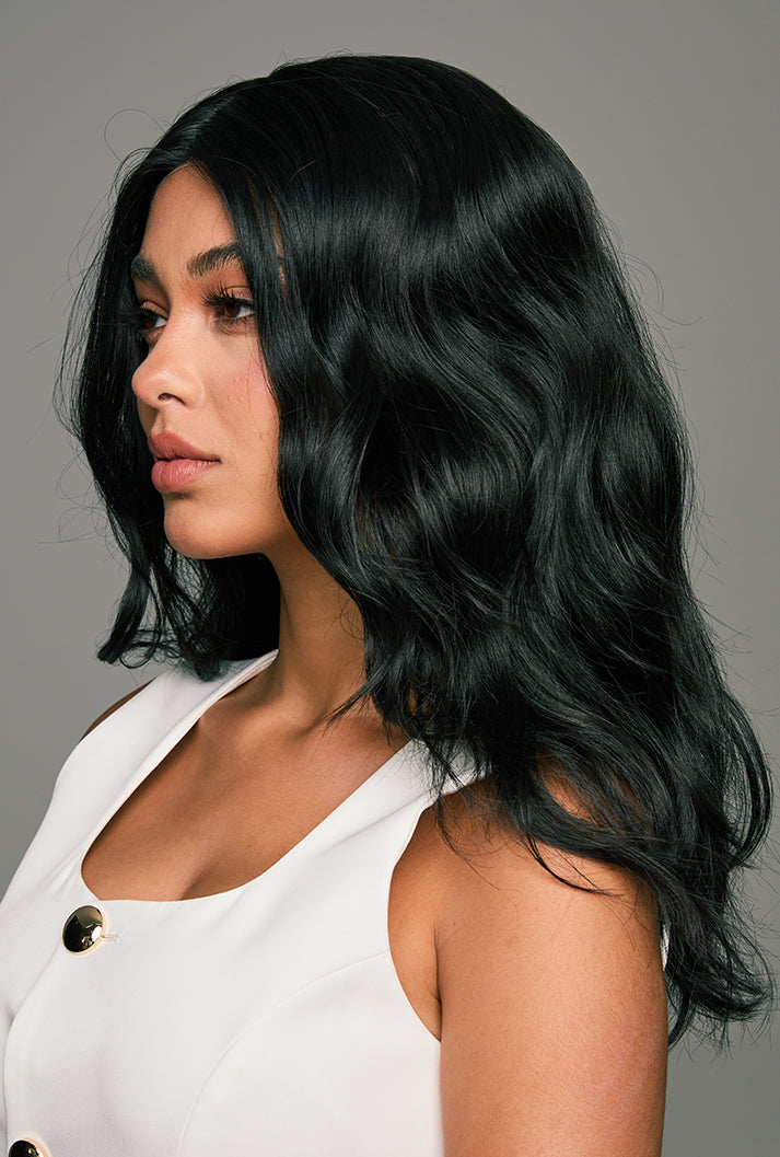 Left side view of Maya wig by Ailsa's Wigs showing ready-to-wear bounce and glossy strands