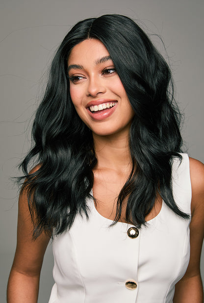 Office-appropriate styling of Maya wig by Ailsa's Wigs with professional yet voluminous curls