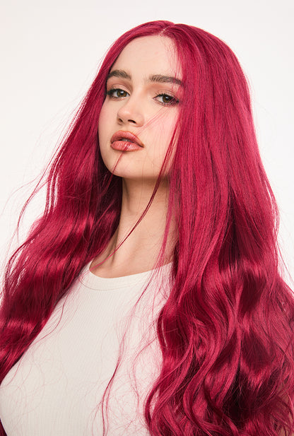 Three-quarter angle view of Scarlett wig by Ailsa's Wigs reveals how the 26-inch body waves create stunning dimension, with face-framing layers that sculpt cheekbones while the deep wine red hue adds warmth to all skin tones.