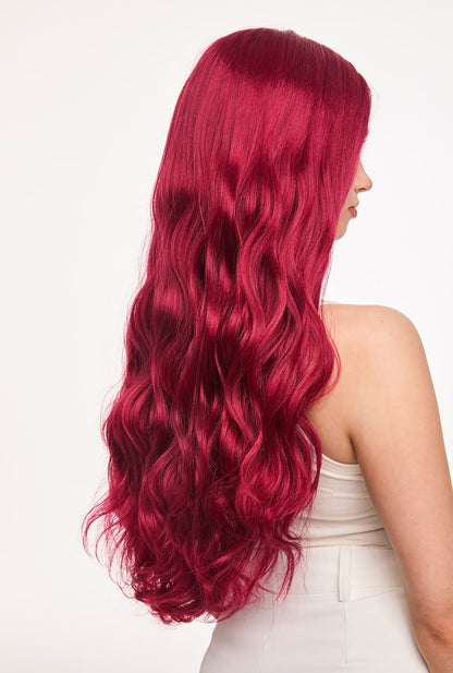 From behind, Scarlett by Ailsa's Wigs is pure drama - 26-inch body waves cascade down like a crimson waterfall, with each curl maintaining perfect definition even in motion, thanks to advanced fiber memory technology.