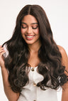 Peyton professional wig by Ailsa's Wigs showcases 26-inch body waves in universal taupe-brown, where dark espresso base meets milk chocolate highlights for boardroom-ready dimension.
