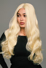 Three-quarter glow revelation: Arya wig by Ailsa's Wigs works its magic, where multidimensional platinum strands artfully illuminate the complexion, creating a natural highlighting effect that enhances every facial feature.
