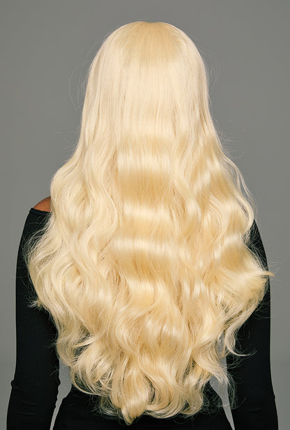 Architectural masterpiece: The back view of Arya wig by Ailsa's Wigs reveals sculpted S-curves that maintain perfect symmetry, each wave holding its form like a frozen moment of liquid platinum in motion.