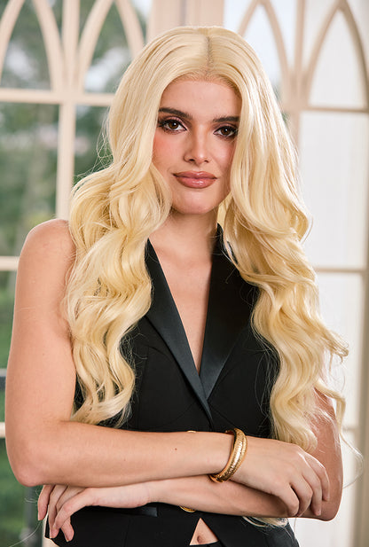 Face-framing feathered layers in Madeline platinum wig by Ailsa's Wigs, offering soft yet voluminous look