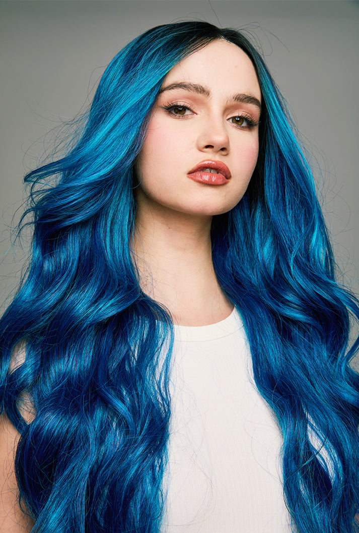 Chloe electric blue wig by Ailsa's Wigs cascading in mesmerizing body waves that steal the spotlight at any party