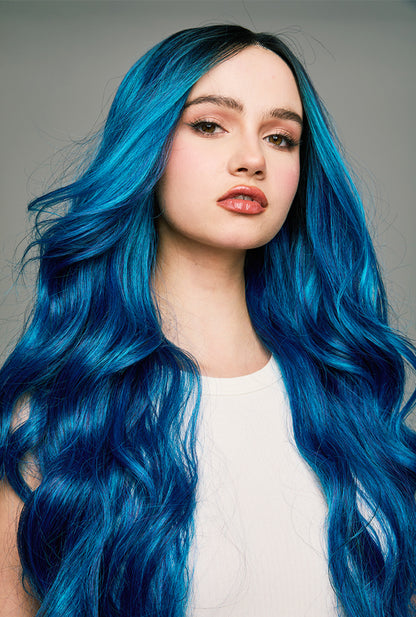 Chloe electric blue wig by Ailsa's Wigs cascading in mesmerizing body waves that steal the spotlight at any party