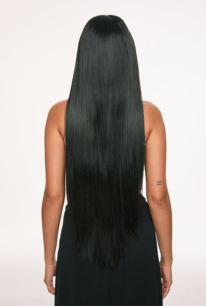 Back view of Clara wig by Ailsa's Wigs cascading to waist-length perfection with knife-edge straightness