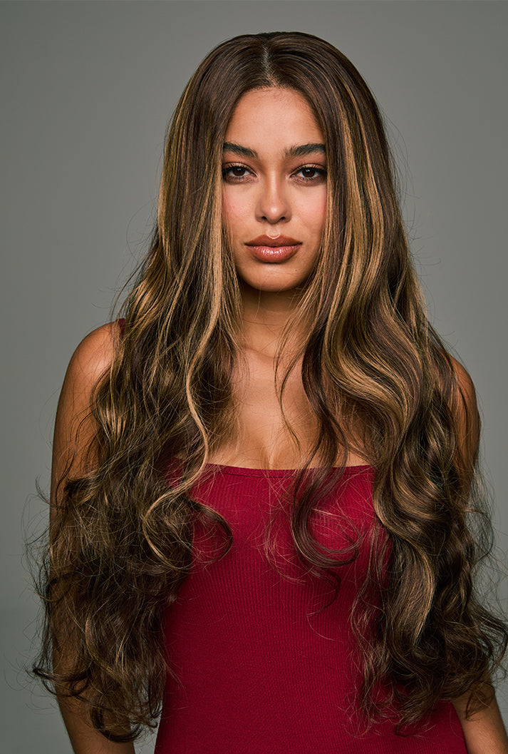 The Willow 28-inch loose wave lace front wig by Ailsa's Wigs, captured from the front view. The natural, body wave curls create a loose yet voluminous look, evoking a sense of wind-blown waves.