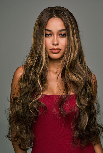 The Willow 28-inch loose wave lace front wig by Ailsa's Wigs, captured from the front view. The natural, body wave curls create a loose yet voluminous look, evoking a sense of wind-blown waves.