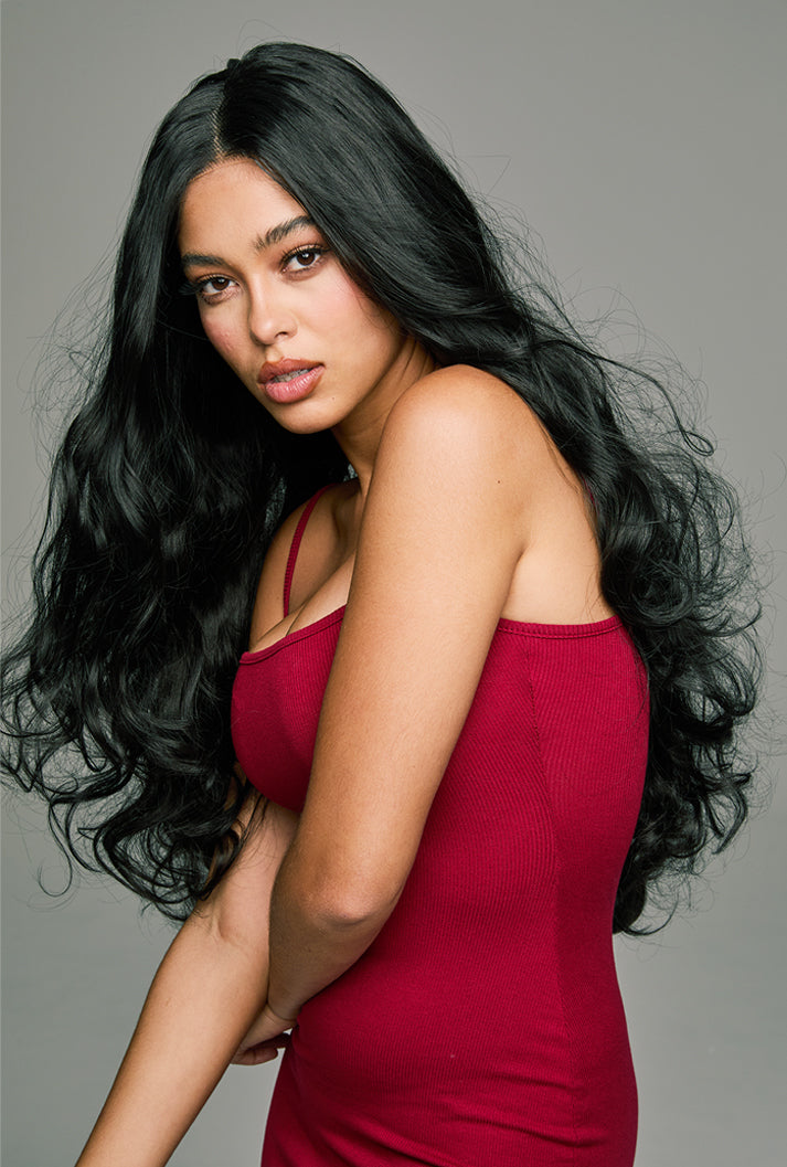 Piper 32-inch natural black loose wave hair wig by Ailsa's Wigs, right front view. Spiral waves create textured volume with a silky, luxurious finish.